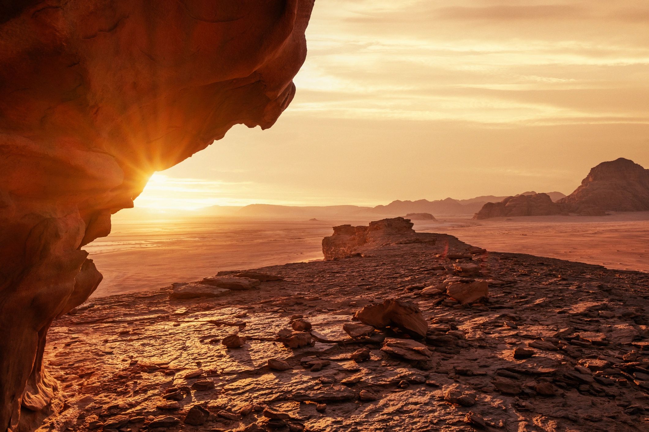 Desert landscape with open sky and sandstone formations